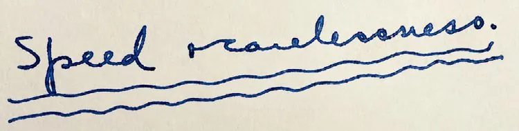 Handwritten note in blue ink reading "Speed + carelessness," underlined twice