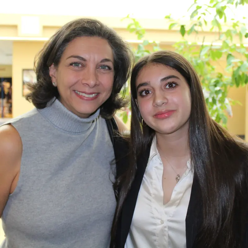 Sandra Vega Russo with her daughter on campus